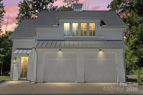a view of a house with a street