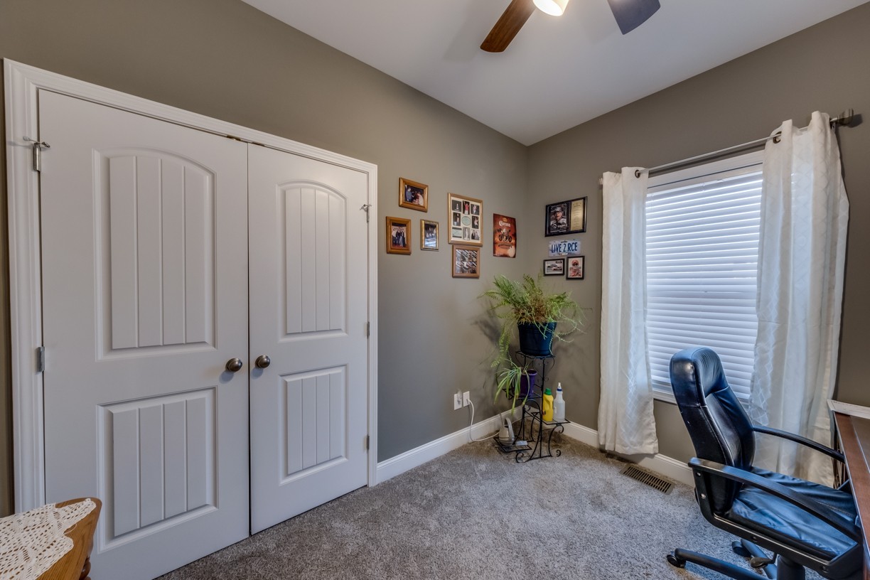 148 A T G T Road Portland, TN 37148 - Photo 18 of 30 a view of a workspace with furniture and a window