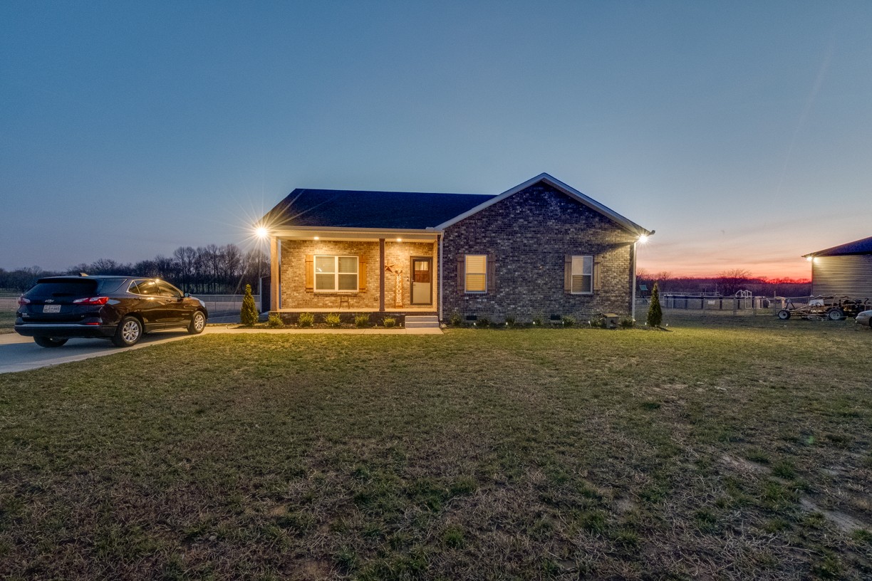 148 A T G T Road Portland, TN 37148 - Photo 28 of 30 a view of an house with backyard space and balcony