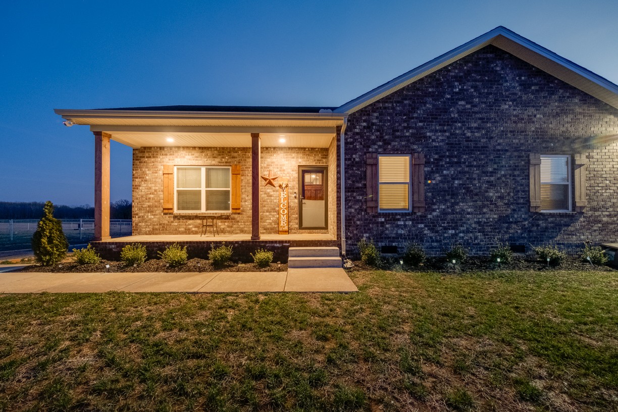 148 A T G T Road Portland, TN 37148 - Photo 30 of 30 a front view of a house with a yard
