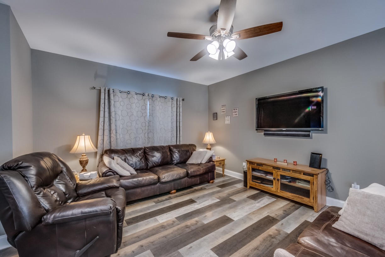 148 A T G T Road Portland, TN 37148 - Photo 5 of 30 a living room with furniture and a flat screen tv