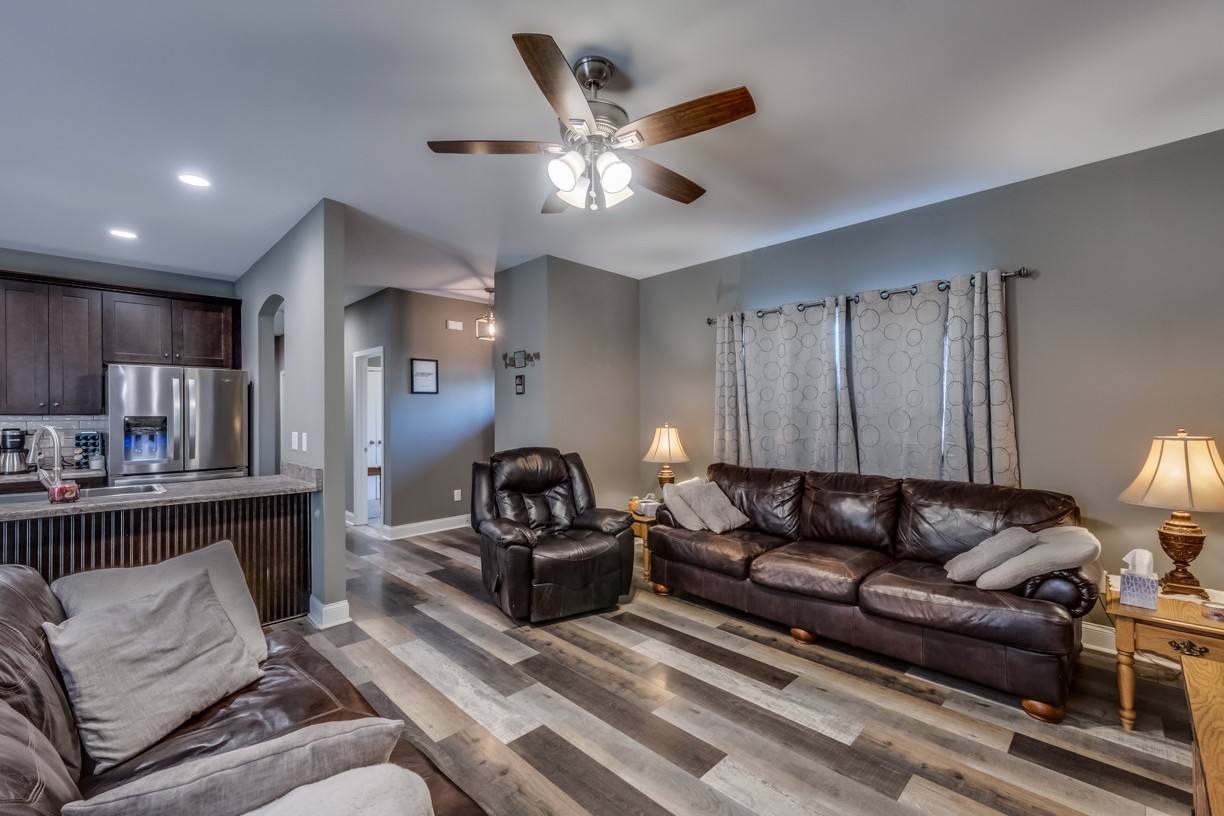 148 A T G T Road Portland, TN 37148 - Photo 7 of 30 a living room with furniture and kitchen view