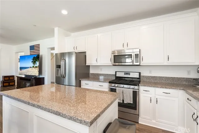 a bed room with furniture and book shelf