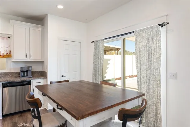 a bathroom with a sink mirror toilet and shower