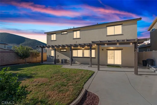 a view of a house with a patio