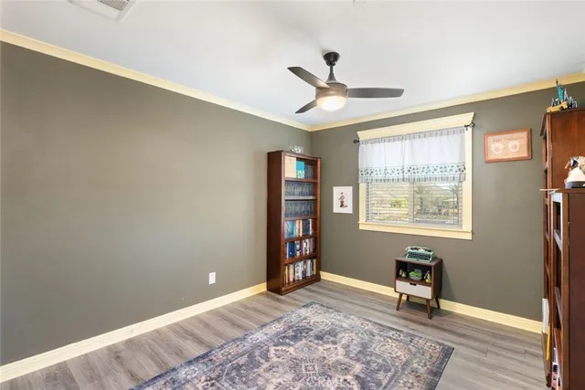 a bed room with a bed and a chandelier