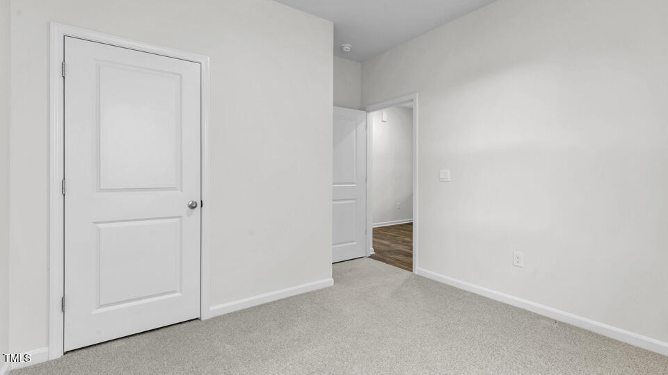 806 Comice Pear Way Willow Spring, NC 27592 - Photo 21 of 37 a view of an empty room