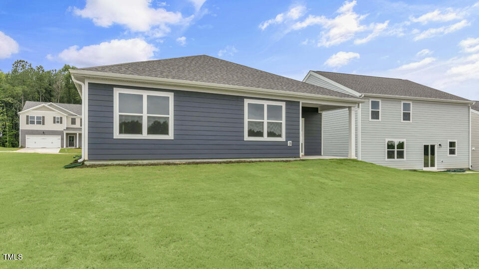 806 Comice Pear Way Willow Spring, NC 27592 - Photo 31 of 37 a house view with a garden space