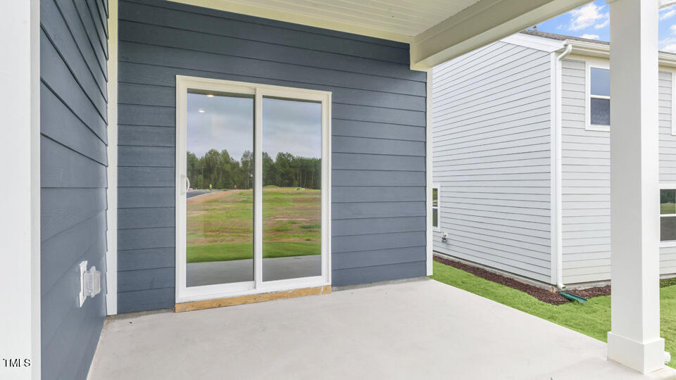 806 Comice Pear Way Willow Spring, NC 27592 - Photo 33 of 37 a view of a backyard of a house