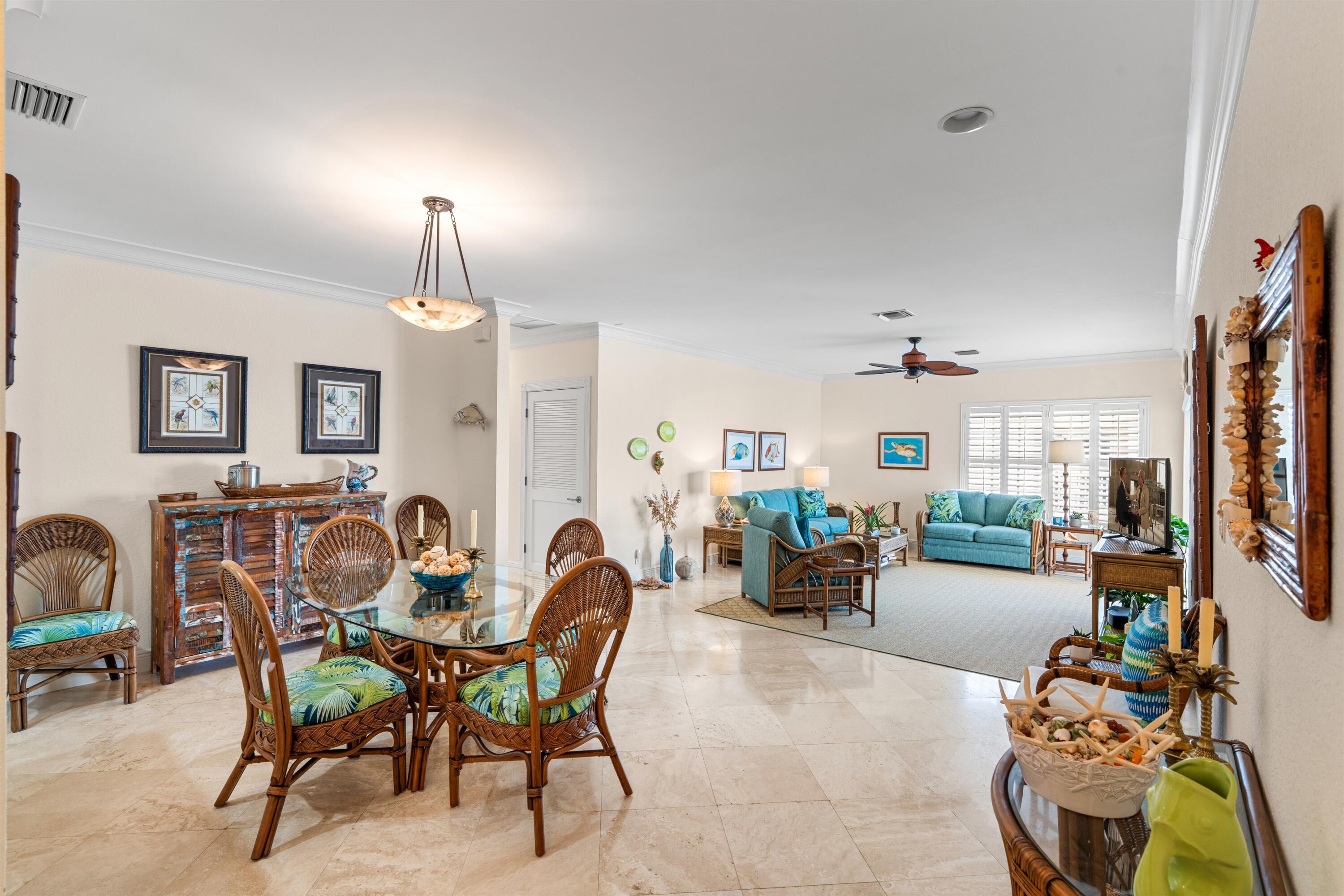 5900 Old Ocean Boulevard, Unit B5 Ocean Ridge, FL 33435 - Photo 3 of 21 a view of a dining room with furniture and chandelier