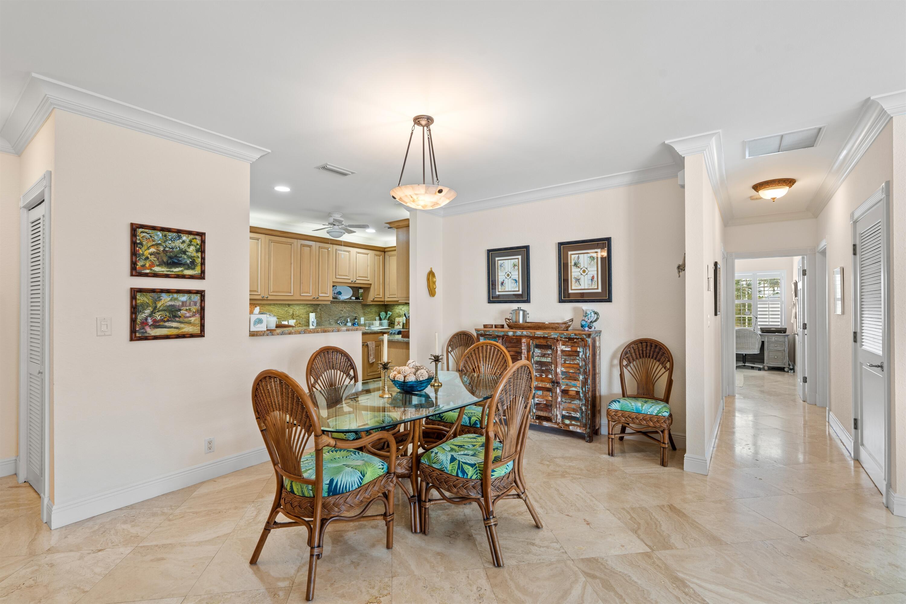 5900 Old Ocean Boulevard, Unit B5 Ocean Ridge, FL 33435 - Photo 4 of 21 a dining room with furniture and window