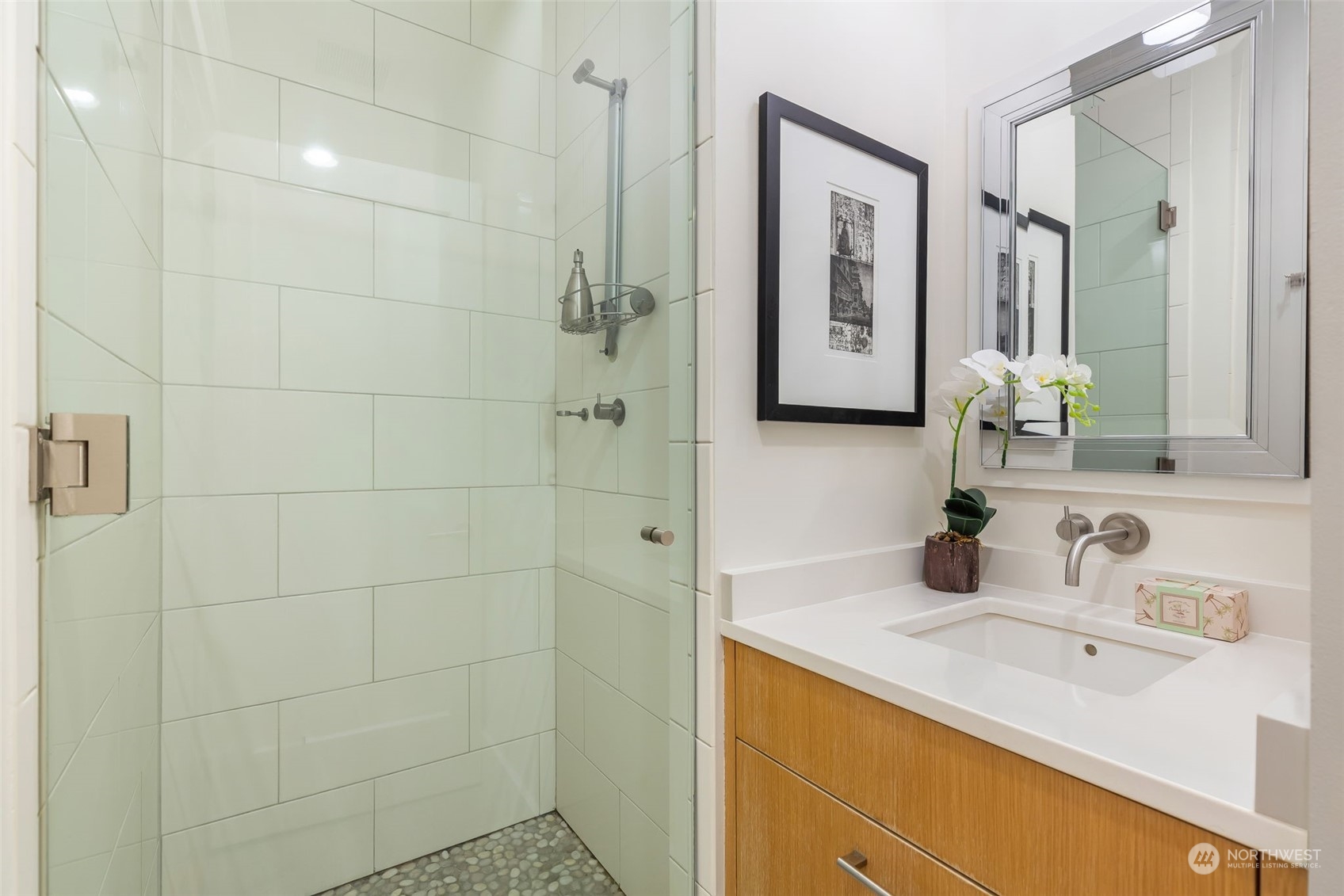 1065 East Prospect Street, Unit 204 Seattle, WA 98102 - Photo 15 of 30 a bathroom with a sink vanity and a mirror