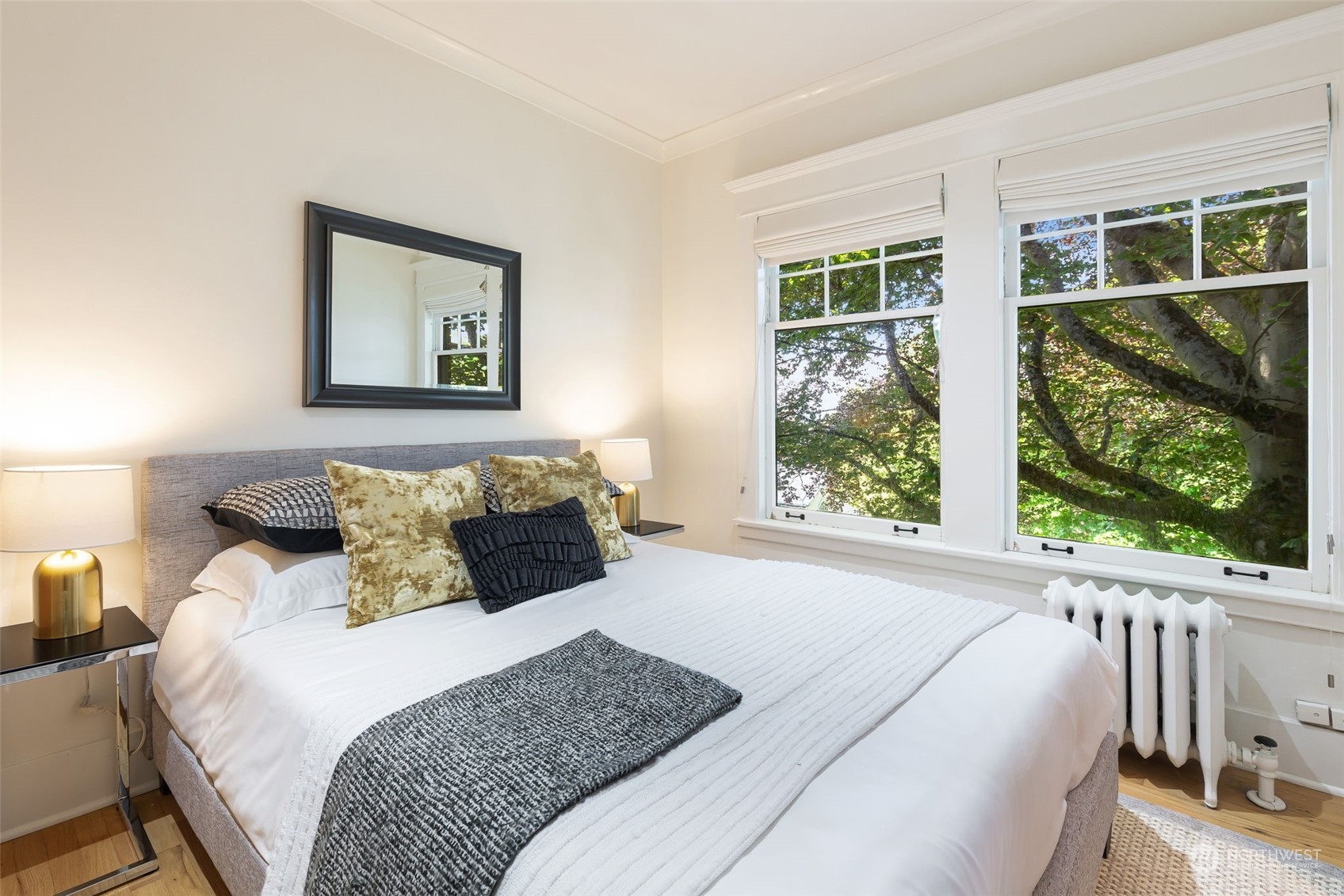 1065 East Prospect Street, Unit 204 Seattle, WA 98102 - Photo 16 of 30 a bedroom with a bed and a window