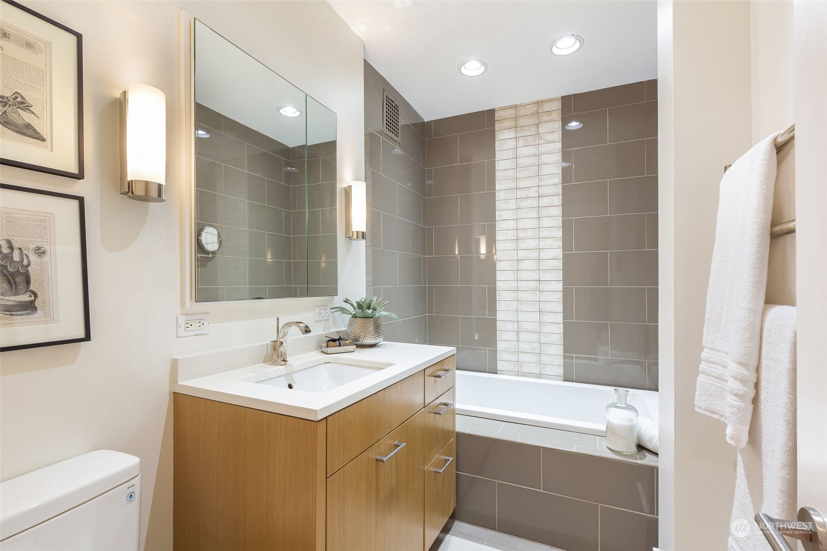 1065 East Prospect Street, Unit 204 Seattle, WA 98102 - Photo 22 of 30 a bathroom with a sink toilet tub and shower