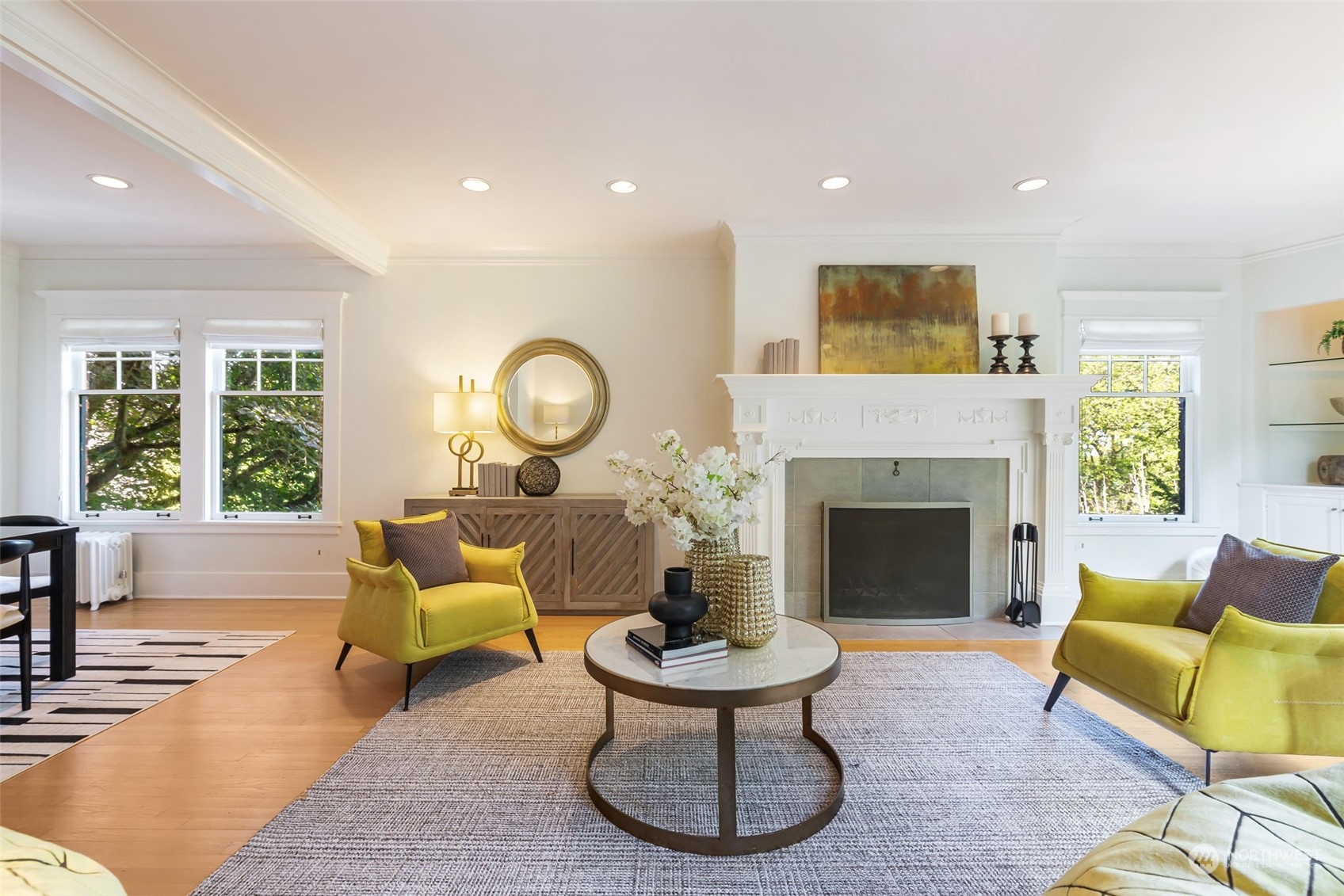 1065 East Prospect Street, Unit 204 Seattle, WA 98102 - Photo 6 of 30 a living room with furniture and a fireplace