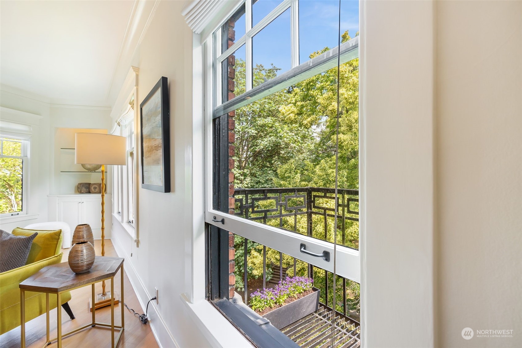 1065 East Prospect Street, Unit 204 Seattle, WA 98102 - Photo 8 of 30 a view of a balcony with chairs