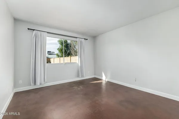 an empty room with windows