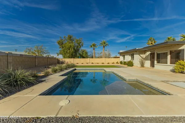 a view of a house with a swimming pool