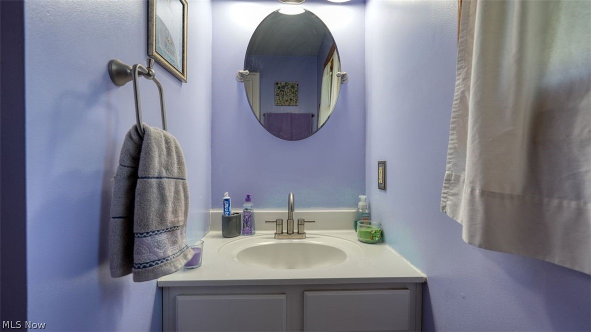 63155 Arrowhead Road Cambridge, OH 43725 - Photo 33 of 50 Bathroom featuring vanity