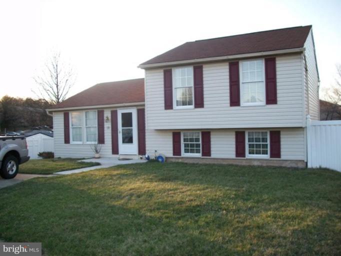 18 Days End Court Rosedale, MD 21237 - Photo 1 of 12 a big house with a big yard and potted plants