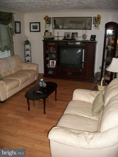 18 Days End Court Rosedale, MD 21237 - Photo 5 of 12 a living room with furniture and a fireplace