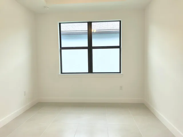 a view of cabinets and window