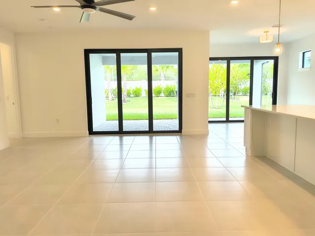 a view of hallway with a large window