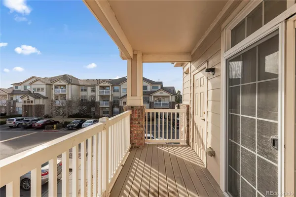 a view of a balcony with city view