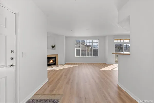 an empty room with windows