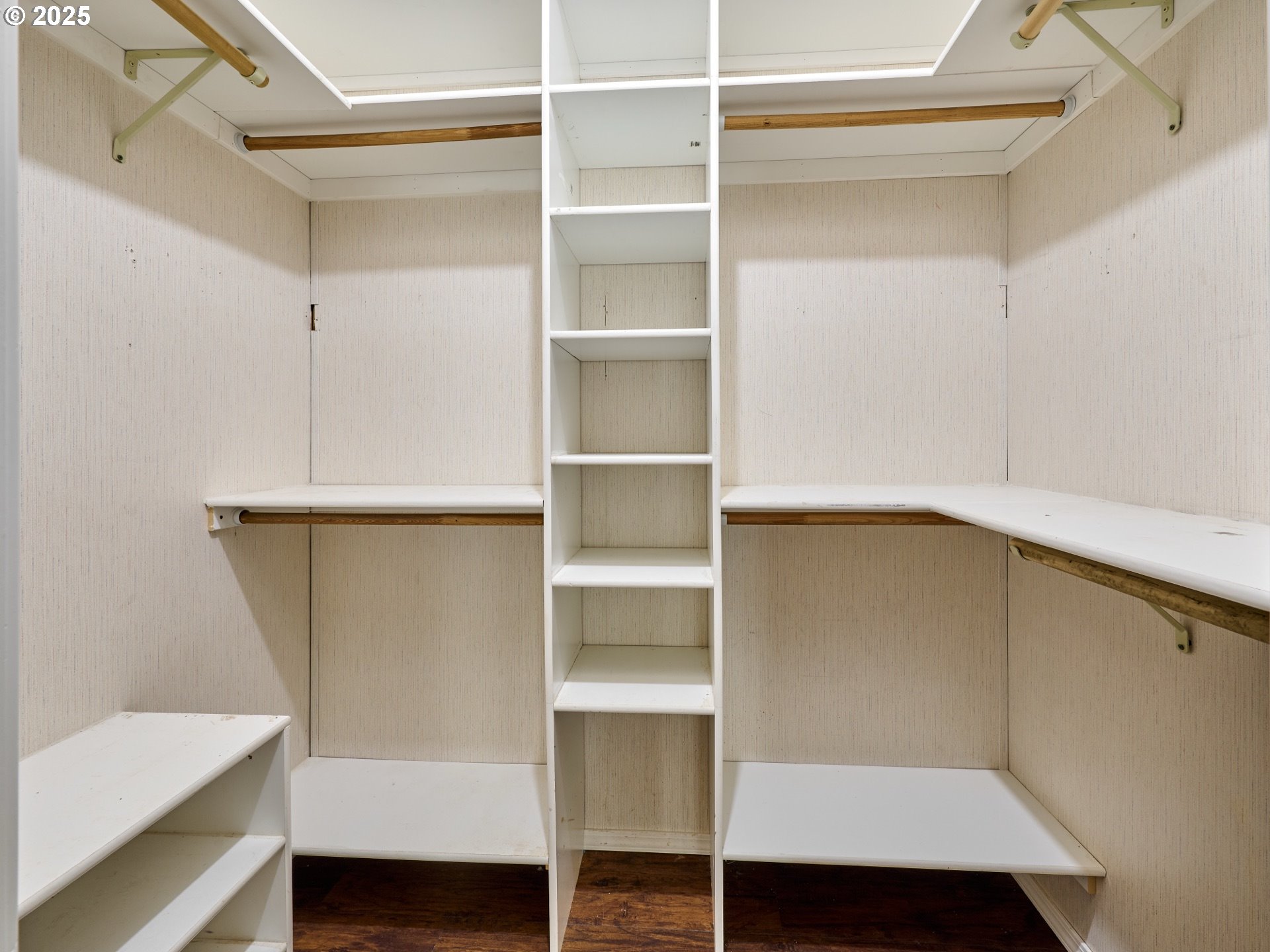 6288 Sherman Road Southeast Aumsville, OR 97325 - Photo 12 of 45 a room with a closet and wooden shelves
