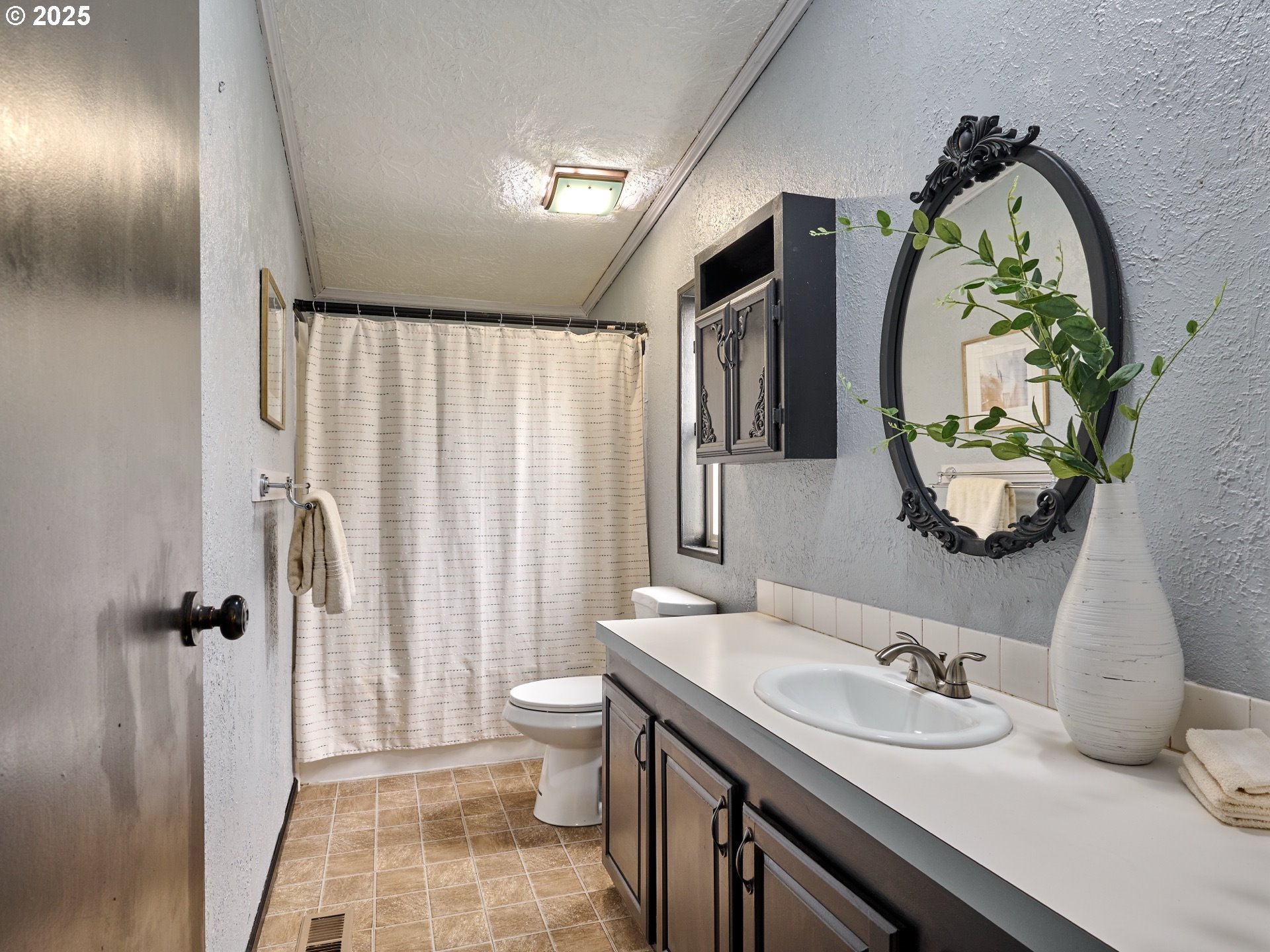 6288 Sherman Road Southeast Aumsville, OR 97325 - Photo 13 of 45 a bathroom with a granite countertop sink and a mirror