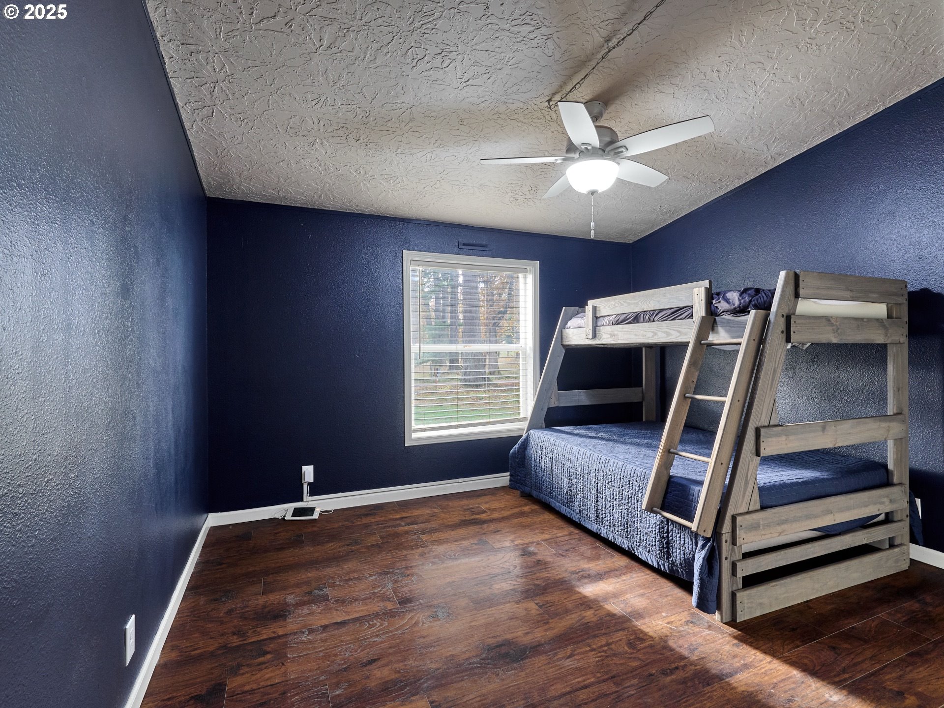 6288 Sherman Road Southeast Aumsville, OR 97325 - Photo 14 of 45 a bedroom with a bed and window