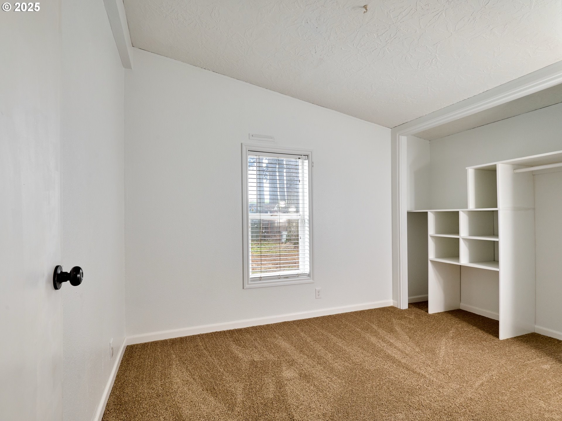 6288 Sherman Road Southeast Aumsville, OR 97325 - Photo 16 of 45 a view of an empty room with a window