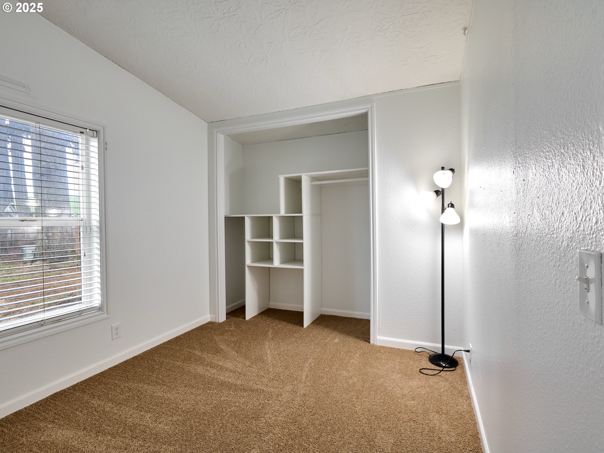 6288 Sherman Road Southeast Aumsville, OR 97325 - Photo 17 of 45 a view of a room with floor to ceiling window and a chandelier