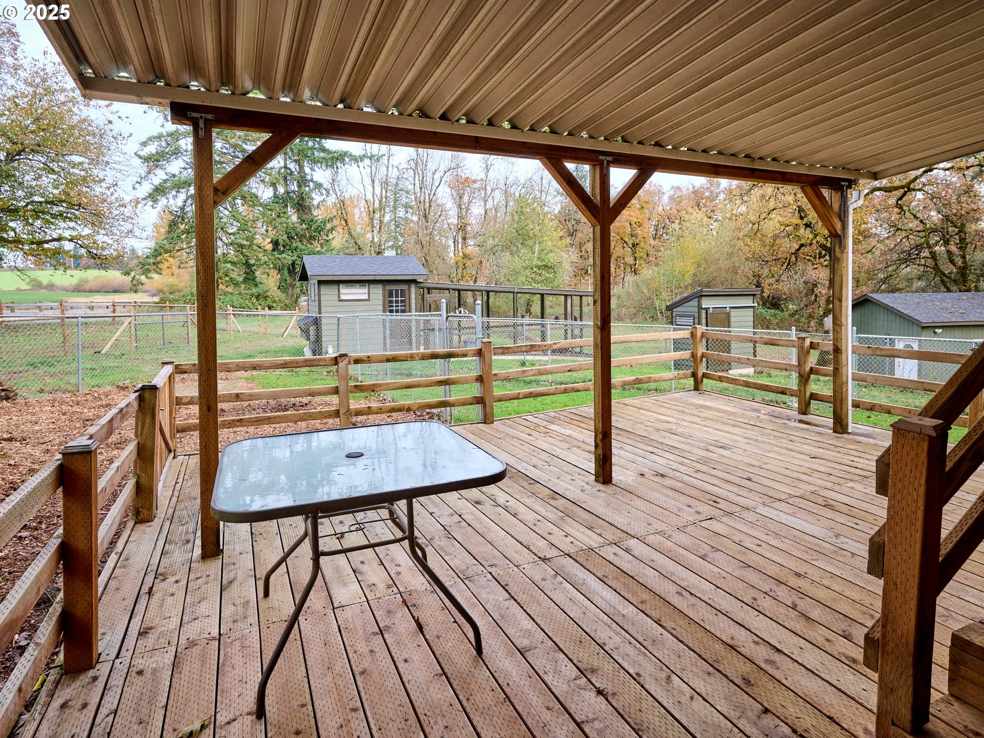6288 Sherman Road Southeast Aumsville, OR 97325 - Photo 21 of 45 a view of a balcony with lake view and a wooden floor