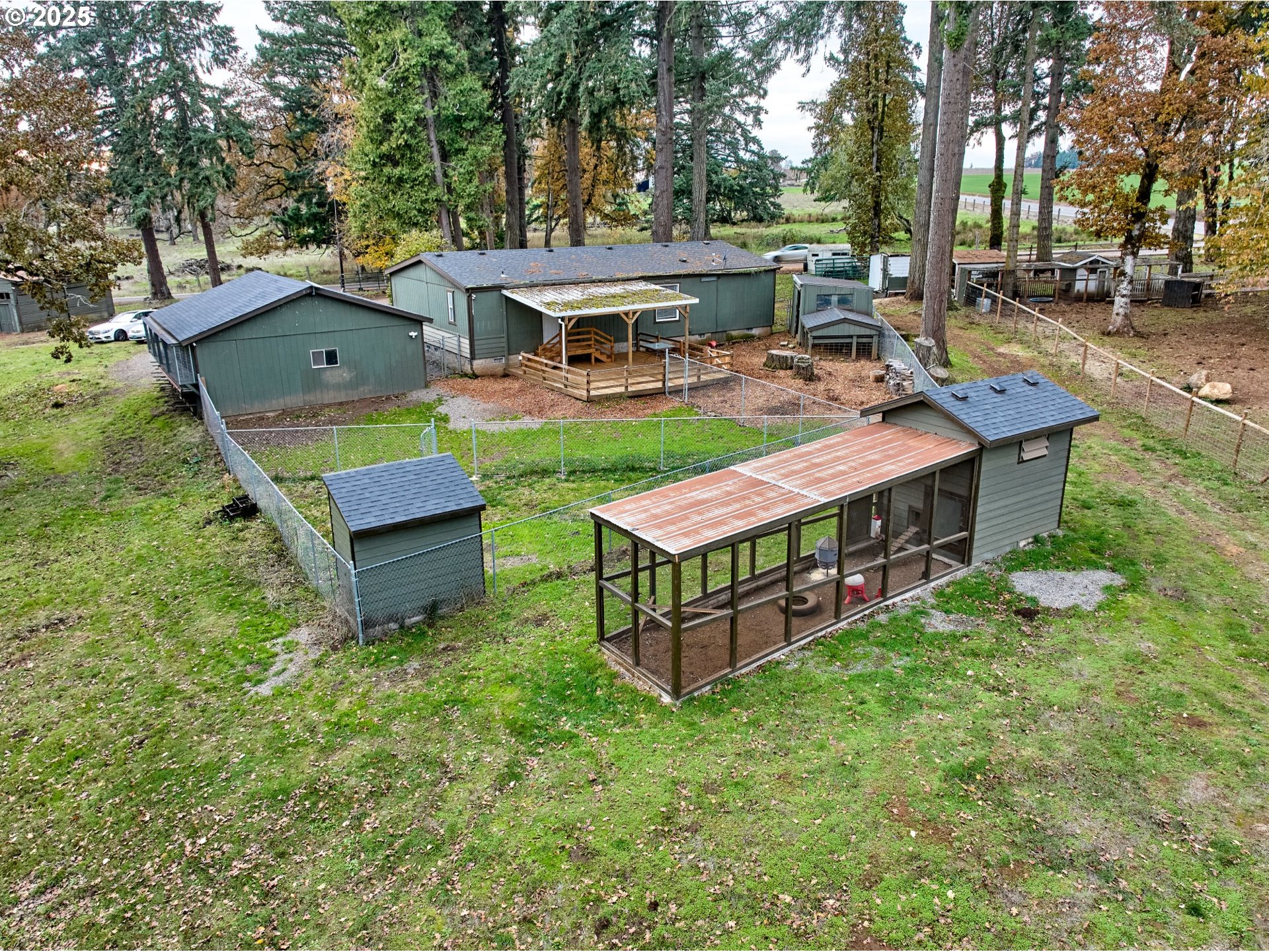 6288 Sherman Road Southeast Aumsville, OR 97325 - Photo 41 of 45 a view of a house with backyard wooden deck and sitting area