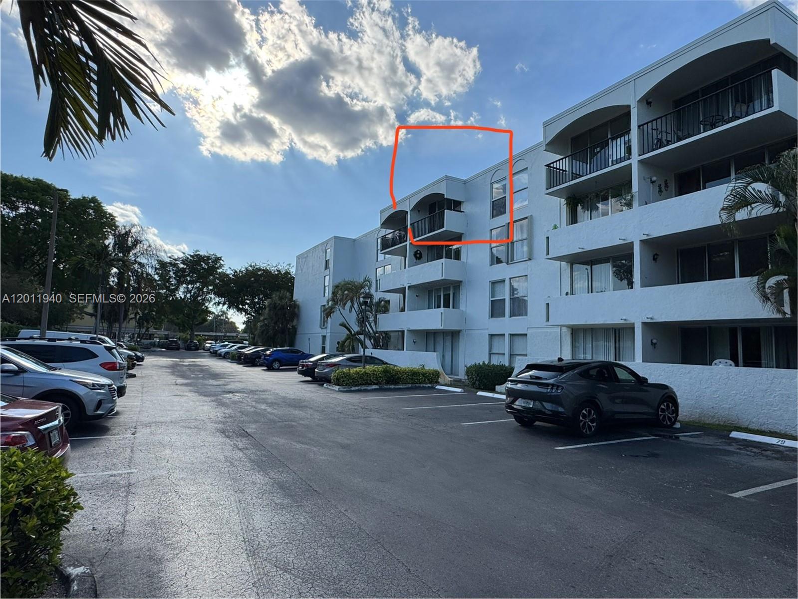 2160 Southwest 16th Avenue, Unit 416 Miami, FL 33145 - Photo 15 of 32 a car parked in front of brick building