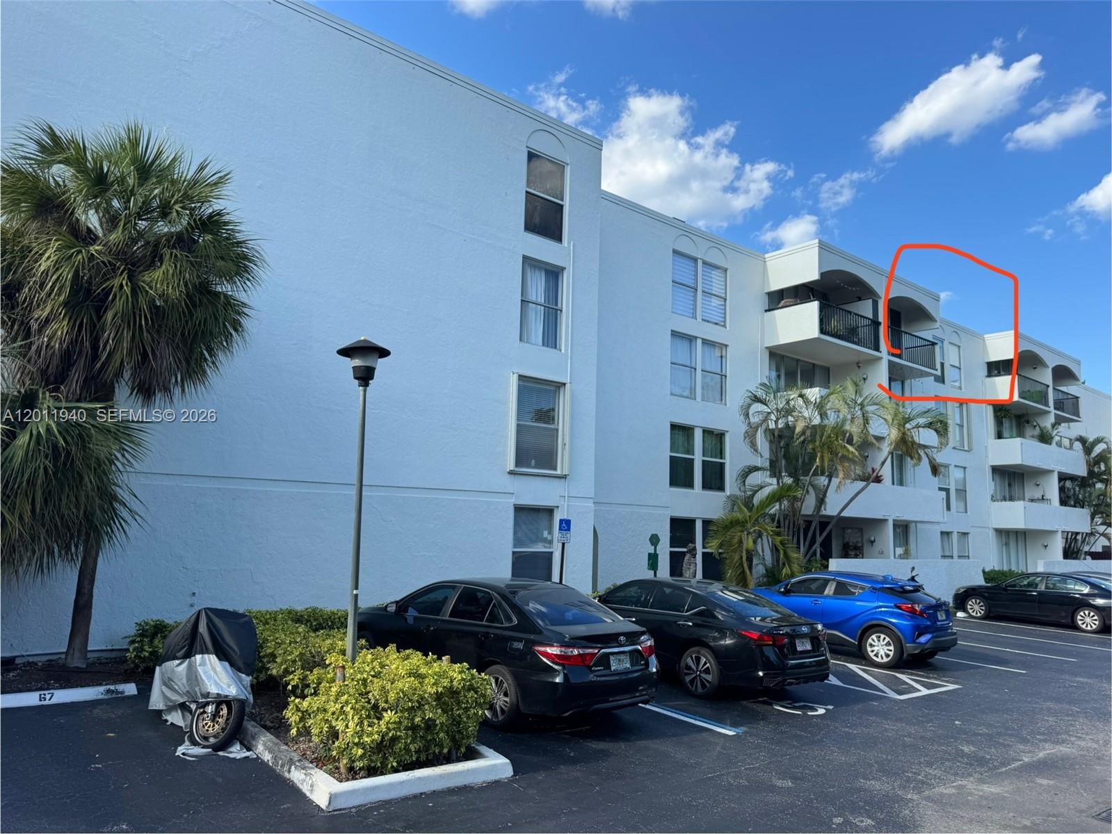 2160 Southwest 16th Avenue, Unit 416 Miami, FL 33145 - Photo 16 of 32 a cars parked in front of a building
