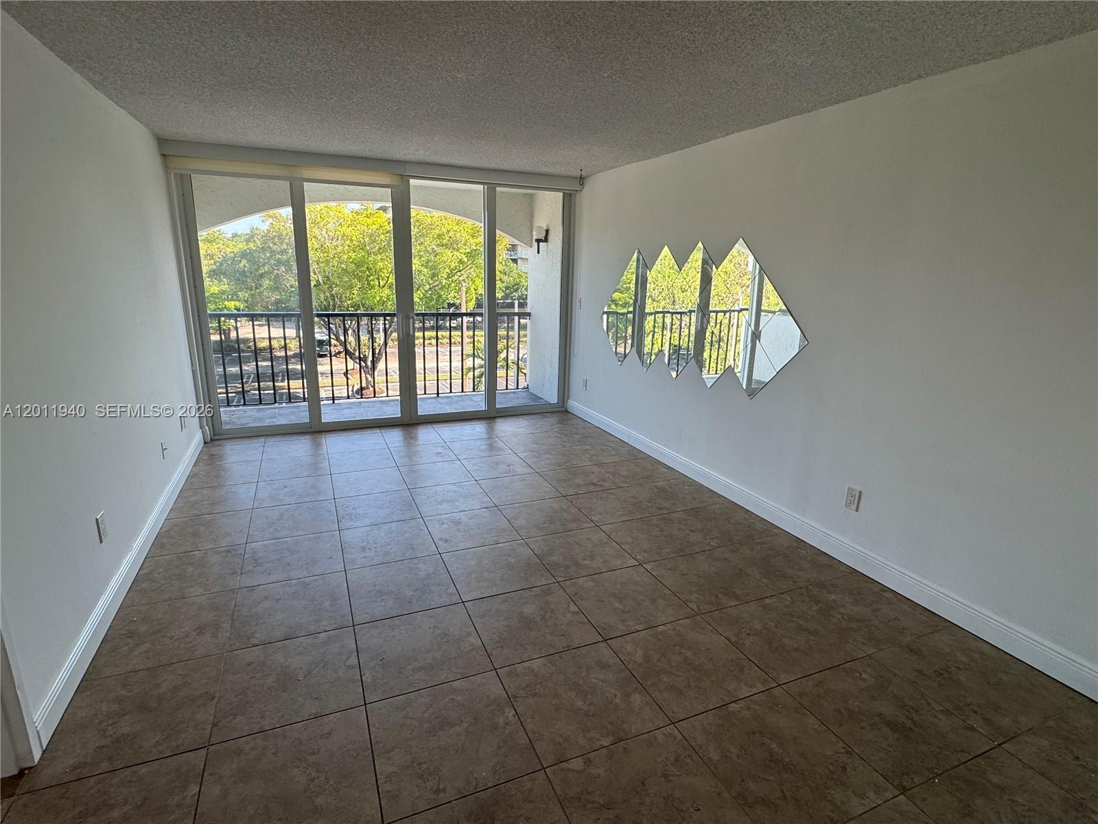 2160 Southwest 16th Avenue, Unit 416 Miami, FL 33145 - Photo 17 of 32 a view of an empty room and window