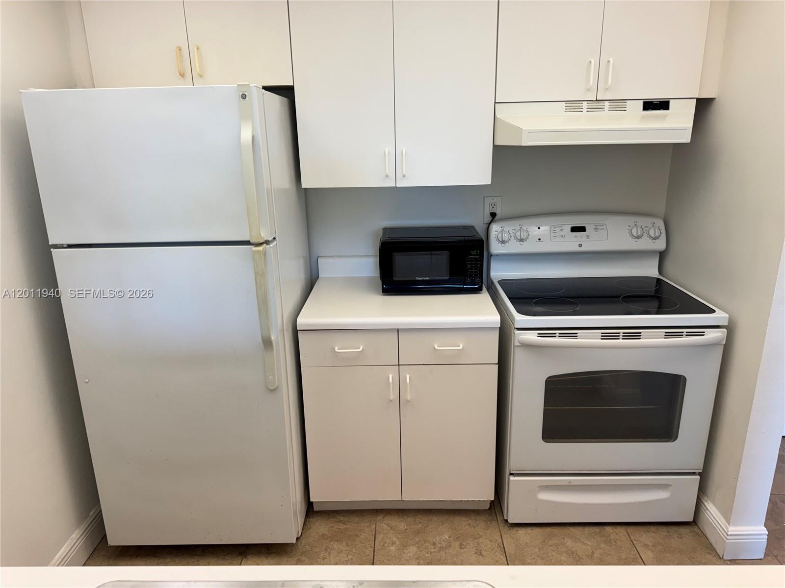 2160 Southwest 16th Avenue, Unit 416 Miami, FL 33145 - Photo 24 of 32 a utility room with dryer and washer