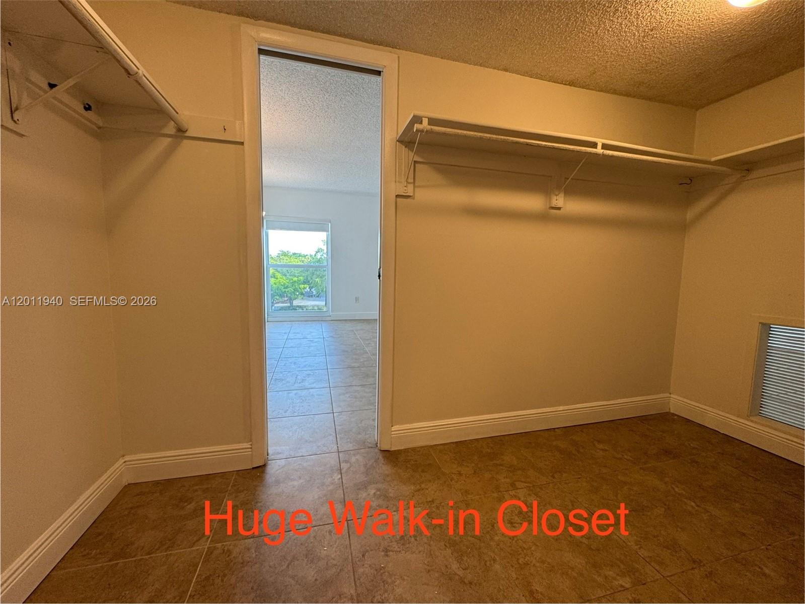 2160 Southwest 16th Avenue, Unit 416 Miami, FL 33145 - Photo 30 of 32 a view of walk in closet