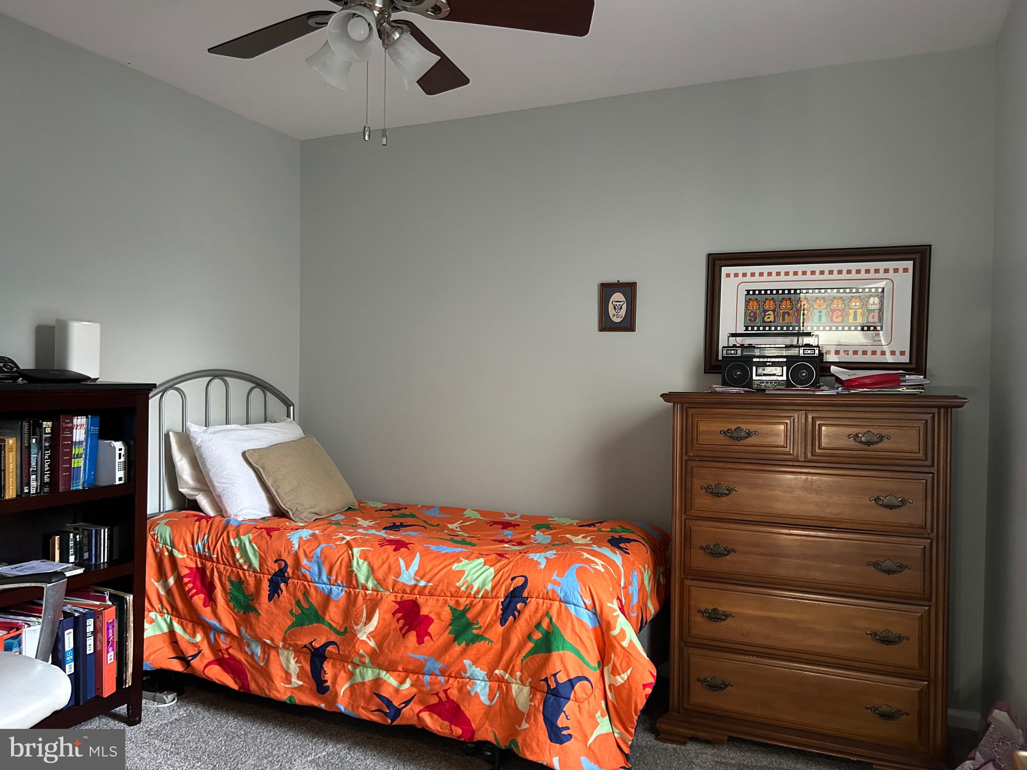 74 Kettlebrook Drive Mount Laurel, NJ 08054 - Photo 21 of 29 a bedroom with a bed and a book shelf