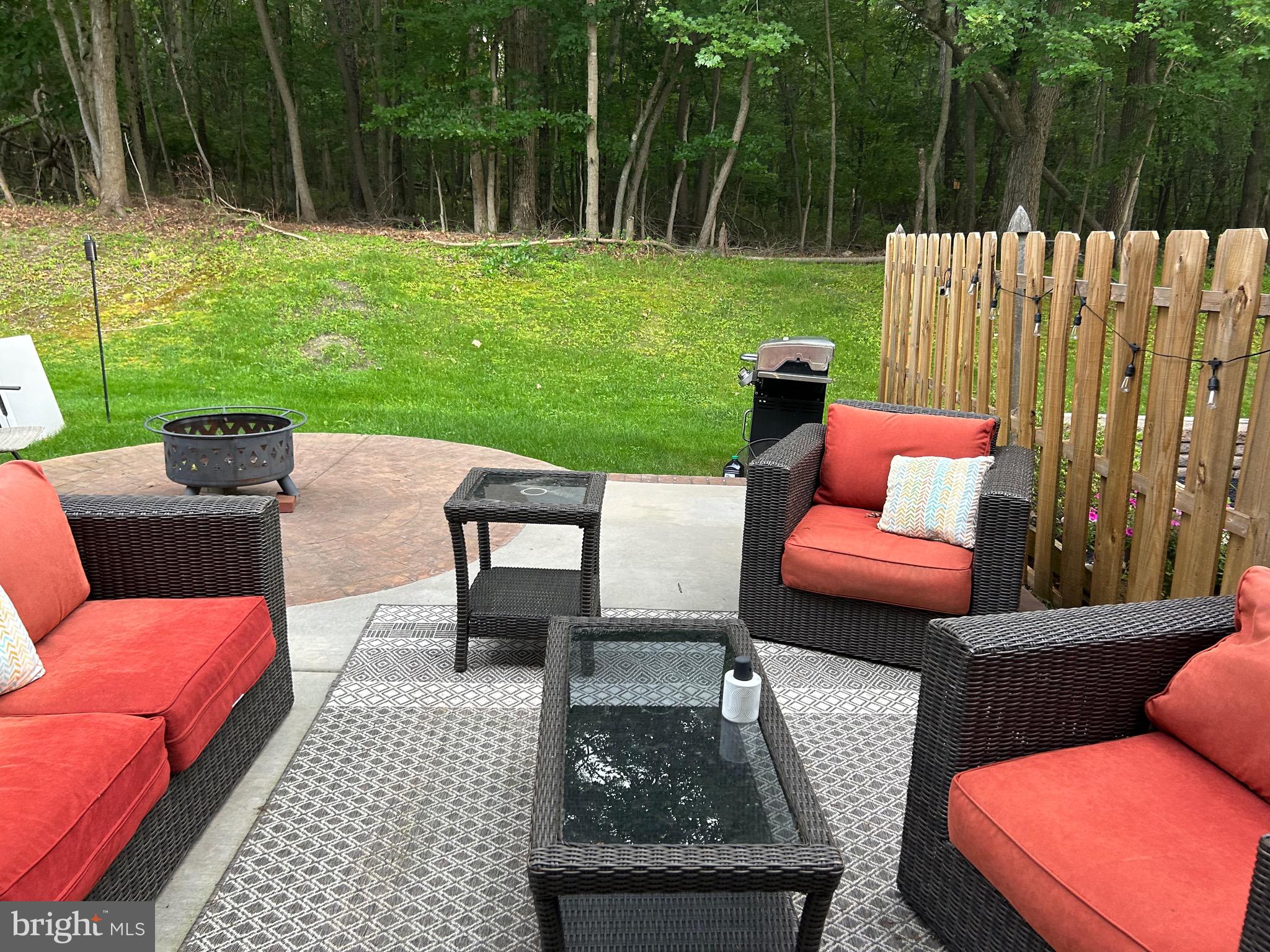 74 Kettlebrook Drive Mount Laurel, NJ 08054 - Photo 25 of 29 a backyard of a house with yard table and chairs