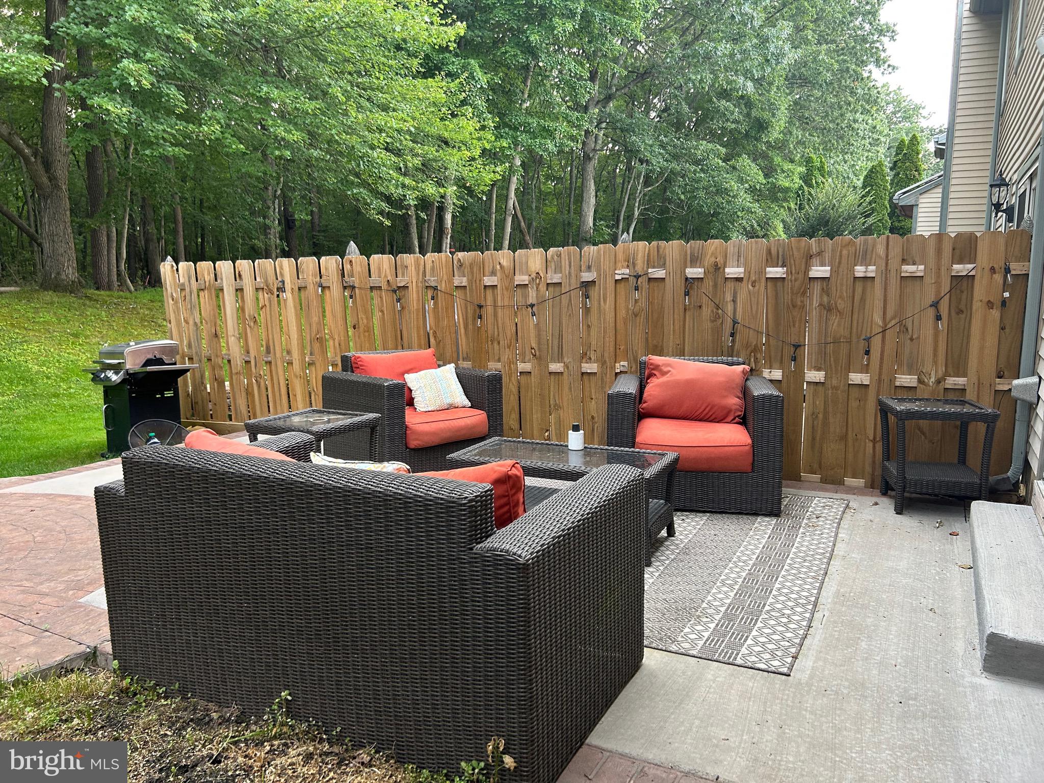 74 Kettlebrook Drive Mount Laurel, NJ 08054 - Photo 26 of 29 a outdoor living space with furniture and a garden