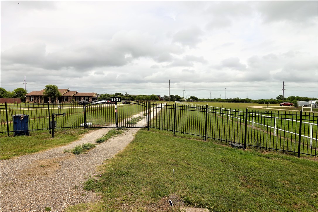 0 County Road 1910 Gregory, TX 78359 - Photo 2 of 21 a view of a lake with a house in the background