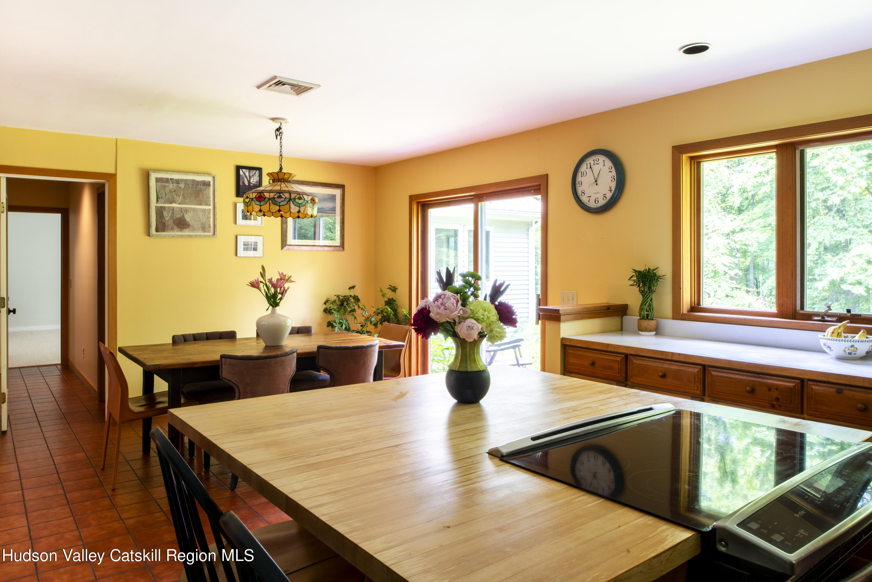 70 Duck Pond Road Stone Ridge, NY 12484 - Photo 12 of 25 a view of a dining room with furniture and wooden floor