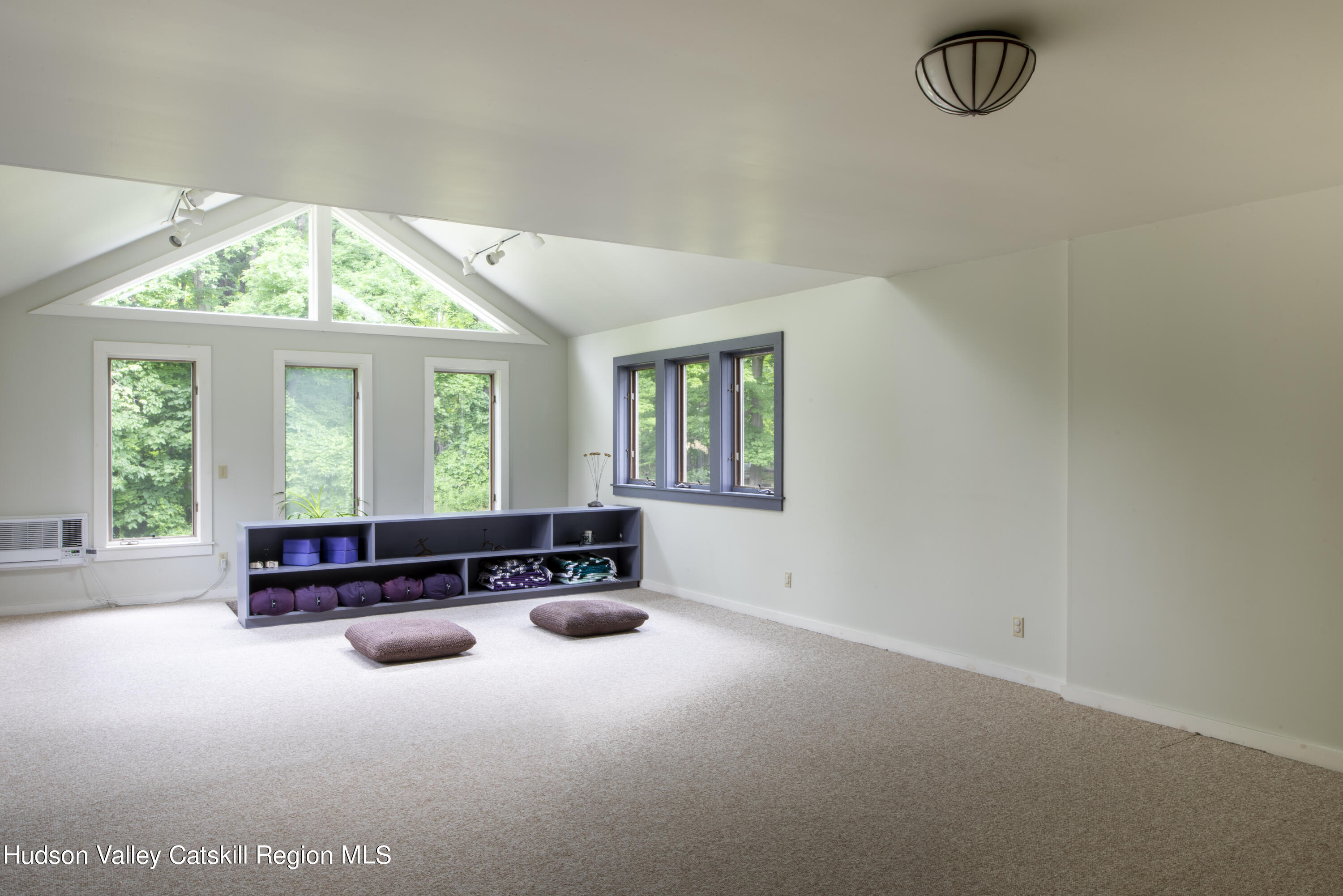 70 Duck Pond Road Stone Ridge, NY 12484 - Photo 17 of 25 an empty room with windows