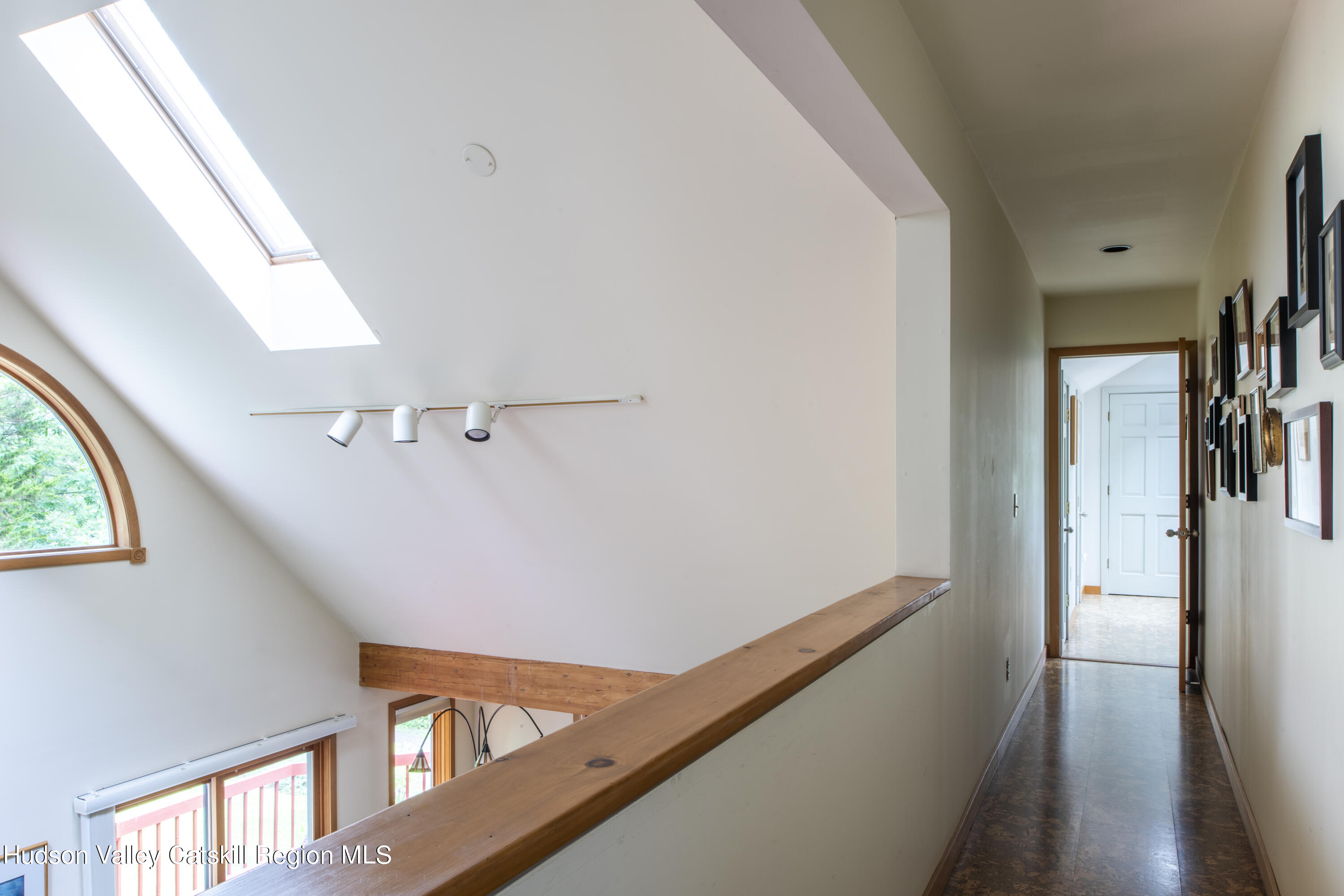70 Duck Pond Road Stone Ridge, NY 12484 - Photo 18 of 25 a view of a hallway with a window