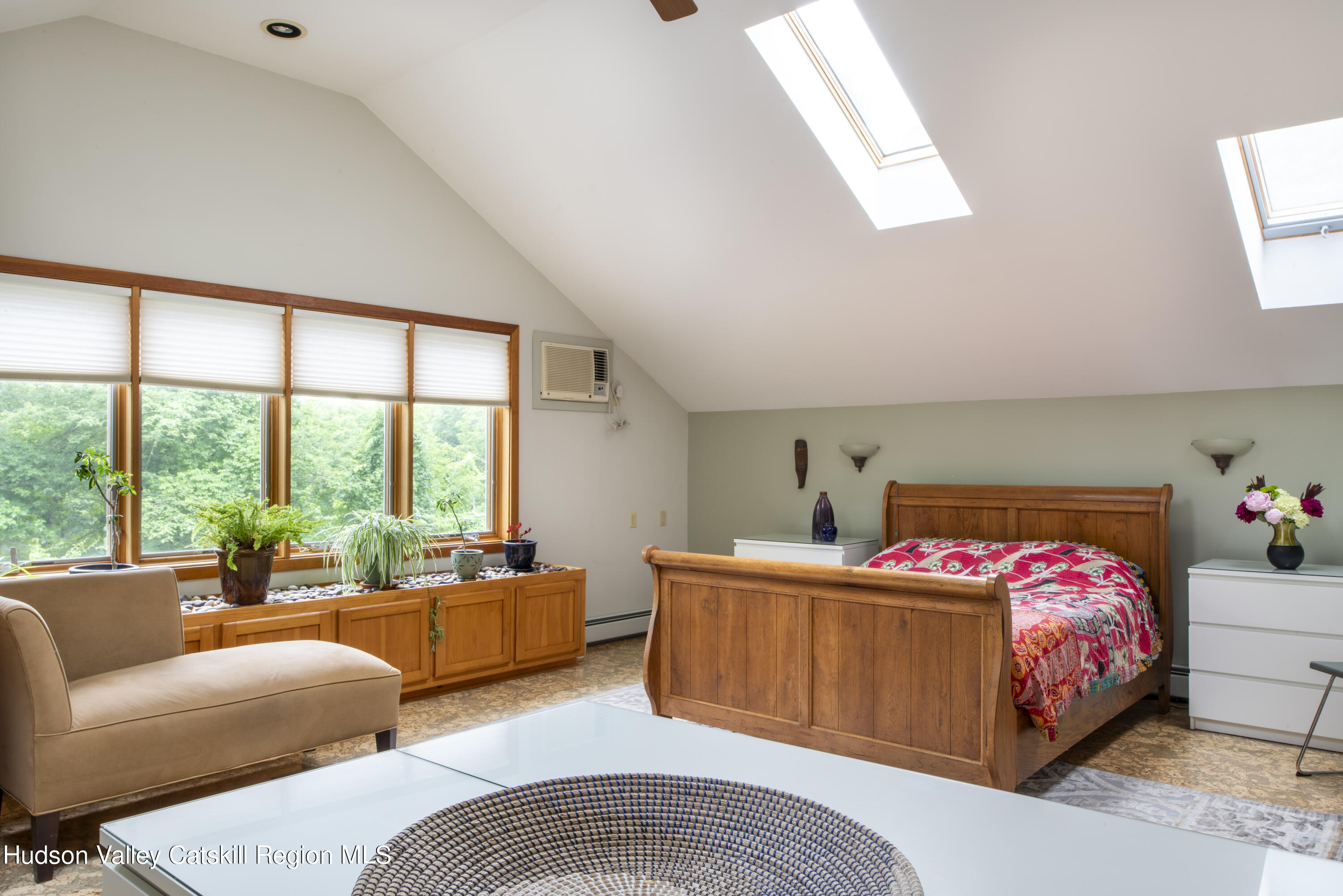 70 Duck Pond Road Stone Ridge, NY 12484 - Photo 19 of 25 a bedroom with a bed and a couch