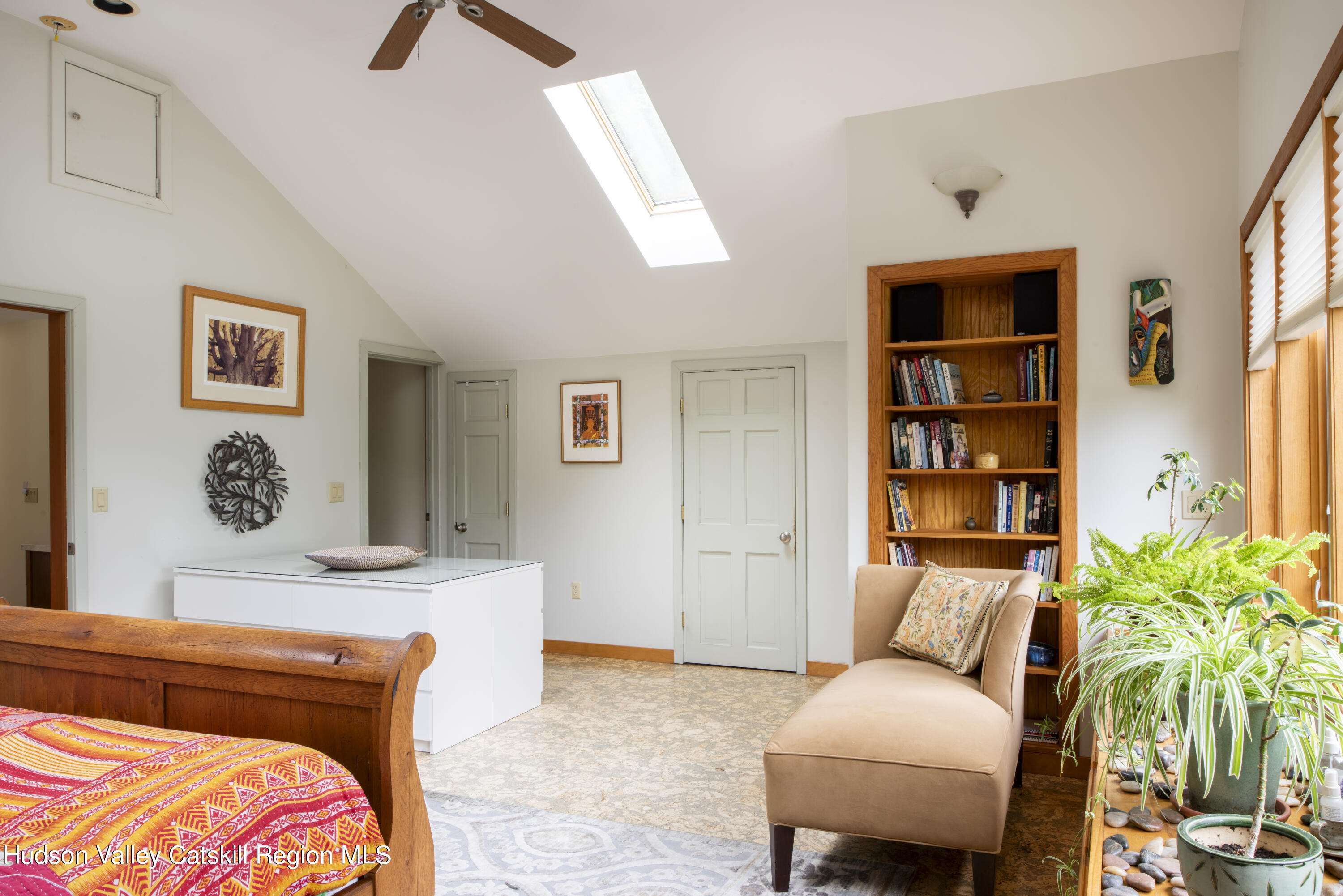 70 Duck Pond Road Stone Ridge, NY 12484 - Photo 20 of 25 a bedroom with furniture and a potted plant